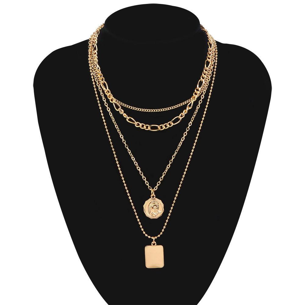 Kerroskaulakoru, FRENCH RIVIERA|Saint Layer Necklace in Gold