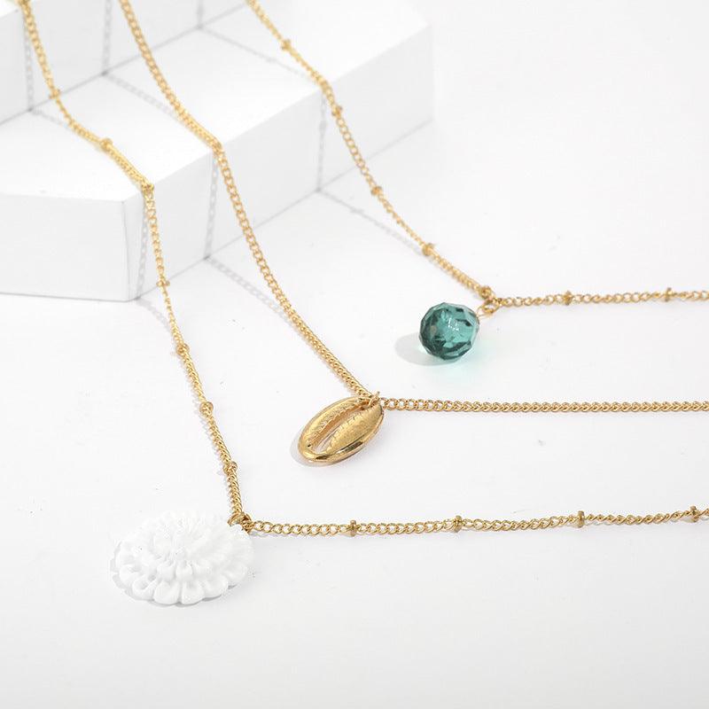 Kerroskaulakoru, FRENCH RIVIERA|Summer Lotus Necklace in Gold