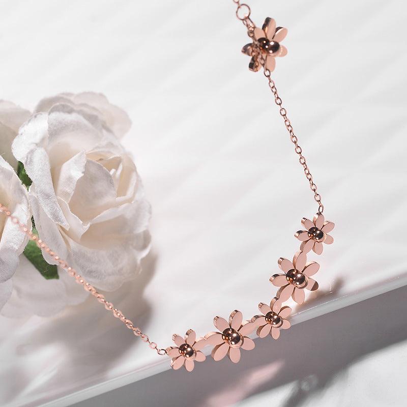 FRENCH RIVIERA|Marguerite flower necklace in surgical steel (rose gold)