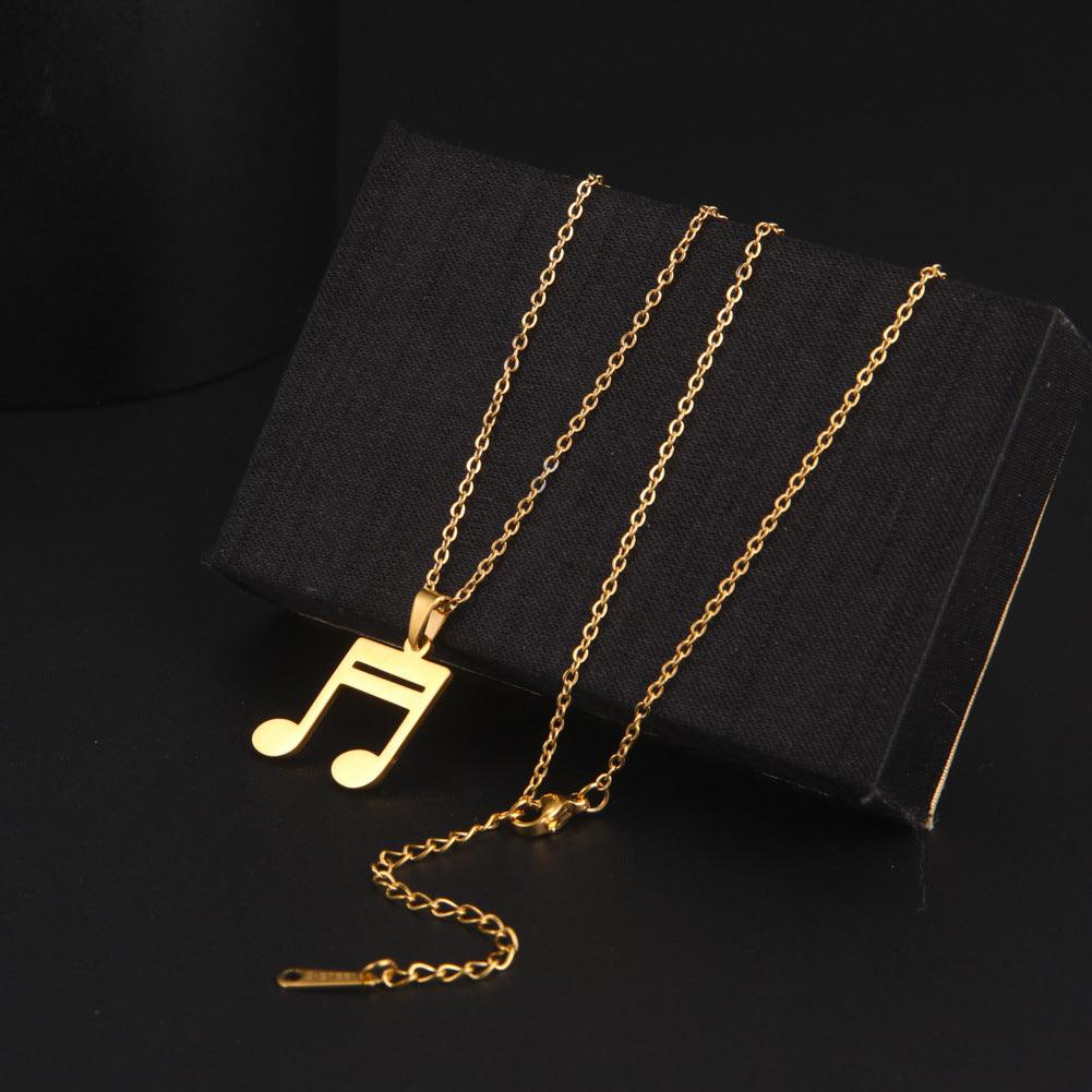 Surgical steel necklace, Play the Music music note necklace (gold)