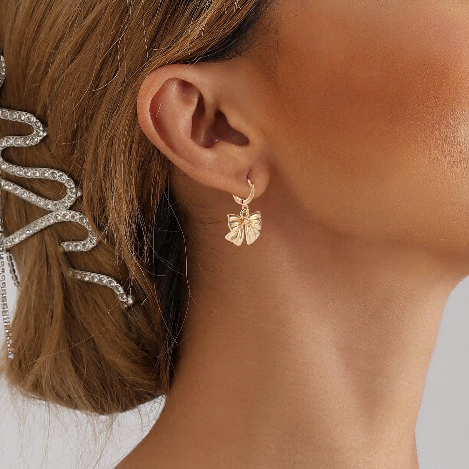 FRENCH RIVIERA | Gold Bowtie earrings