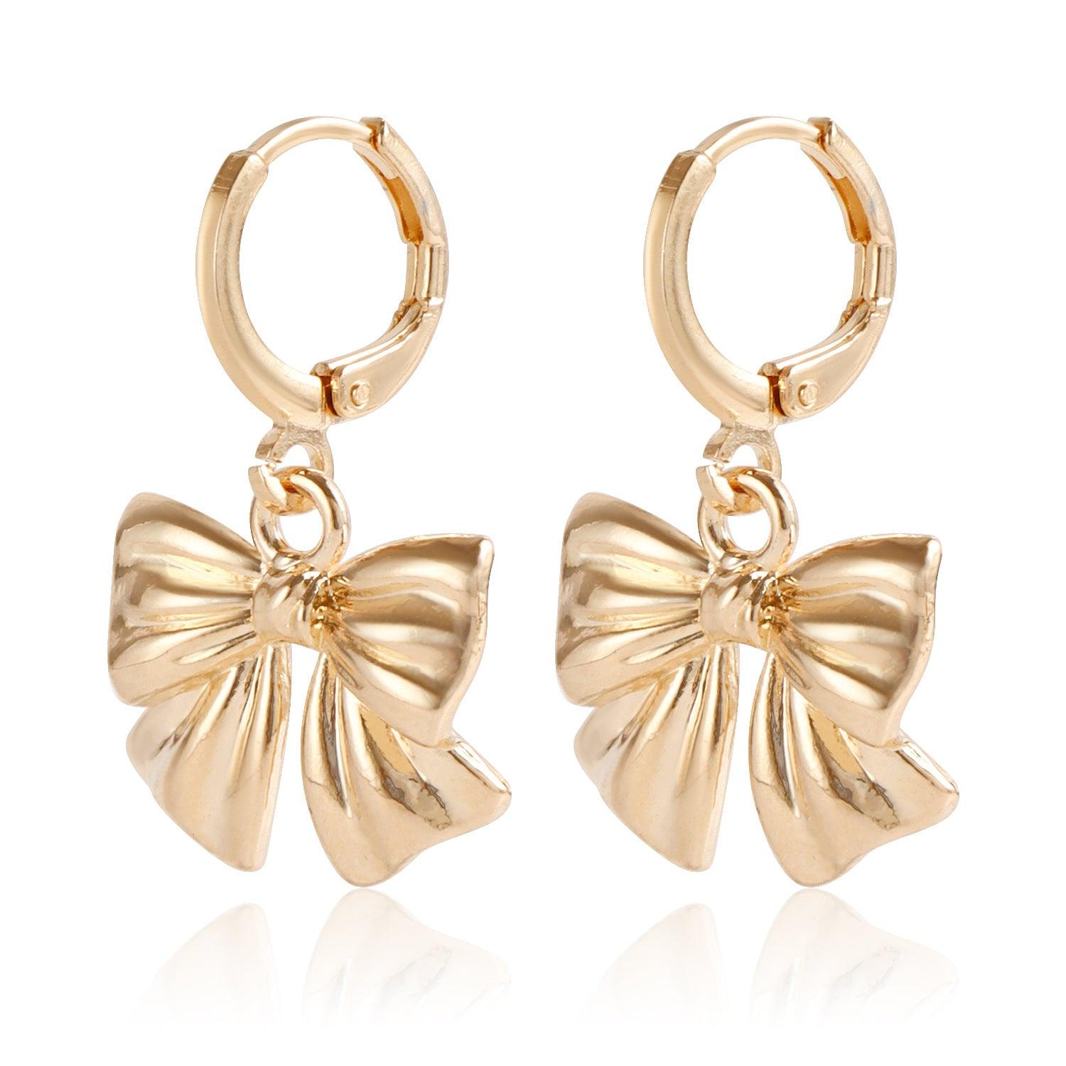 FRENCH RIVIERA | Gold Bowtie earrings