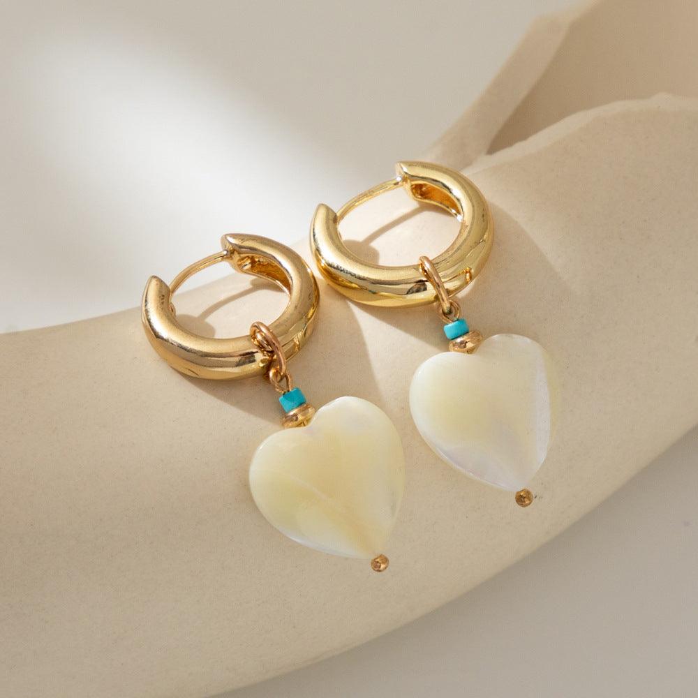 FRENCH RIVIERA | Kristyn gold-colored rings with heart decorations